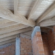 struttura in legno chiaro con dettagli progetto 2